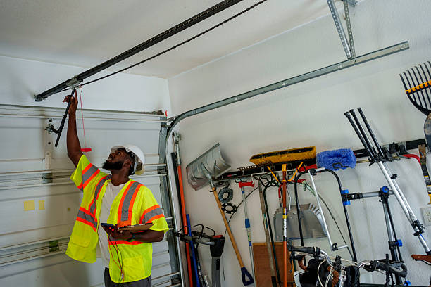 Professional Garage Door Panel Replacement technician working in Brownlee Park, MI
